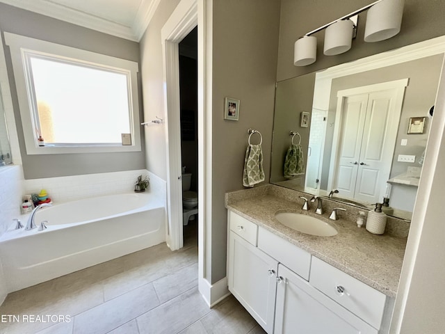 bathroom featuring toilet, a washtub, tile patterned flooring, crown molding, and vanity