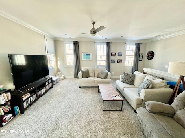 living room featuring light carpet, ornamental molding, and ceiling fan