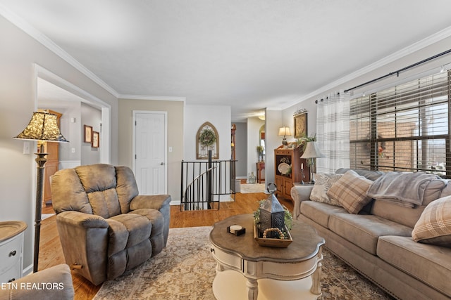 living room with ornamental molding and wood-type flooring