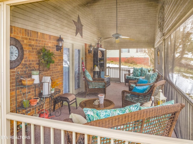 exterior space with ceiling fan and outdoor lounge area