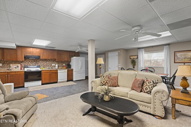 living room featuring ceiling fan