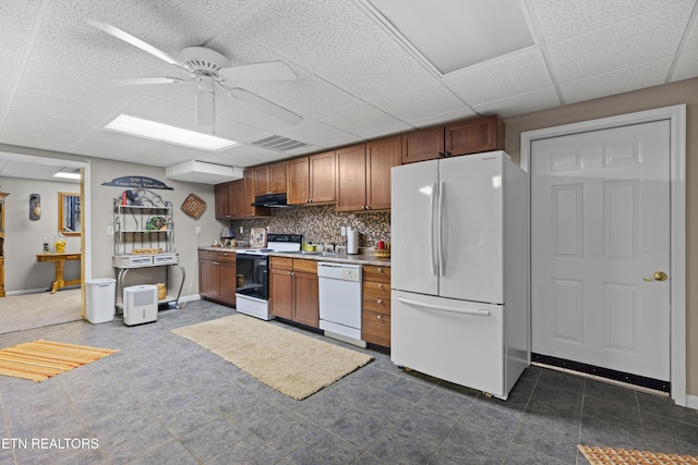 kitchen with white appliances, range hood, a drop ceiling, tasteful backsplash, and ceiling fan