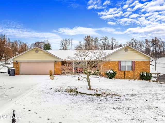 single story home with a garage