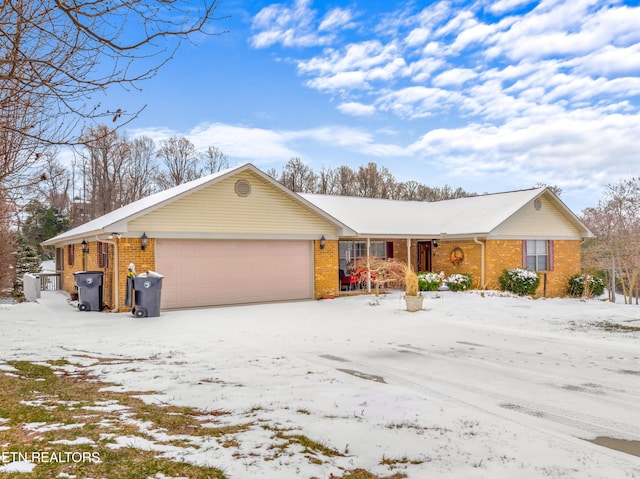 single story home with a garage