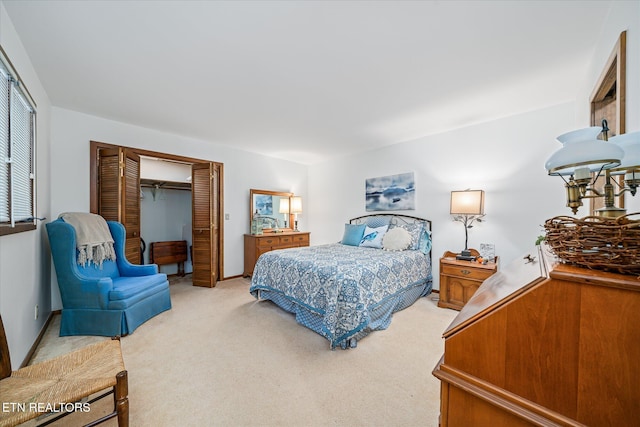 carpeted bedroom featuring a closet