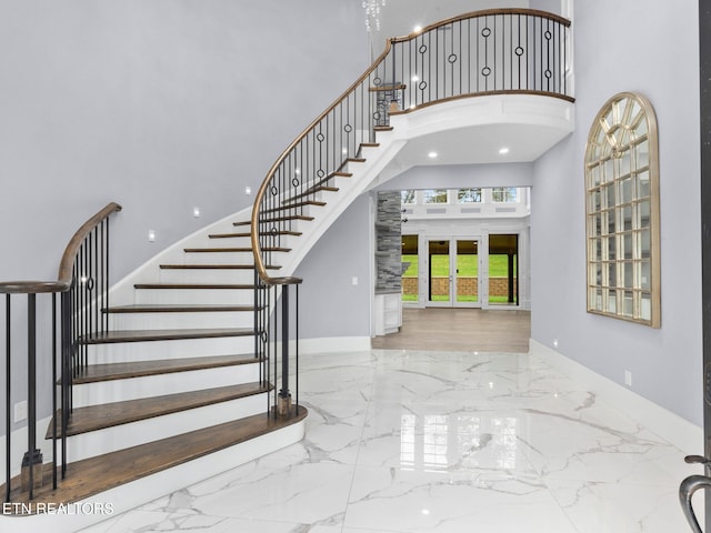 entrance foyer featuring a high ceiling