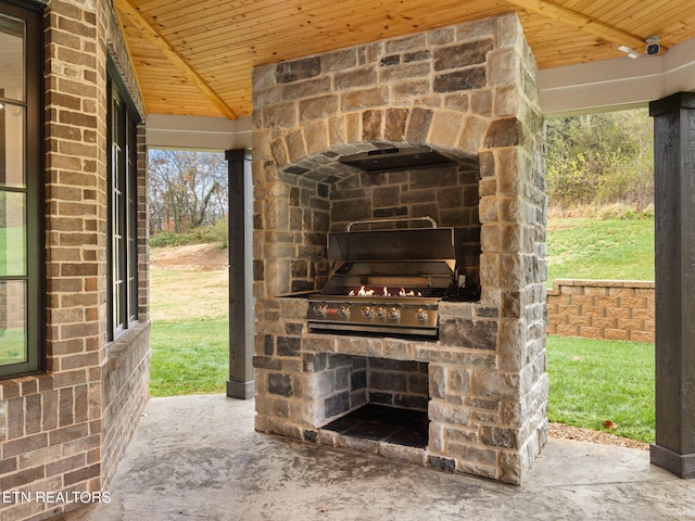 view of patio / terrace with an outdoor kitchen and area for grilling