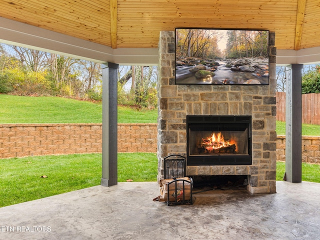 view of patio / terrace with an outdoor stone fireplace