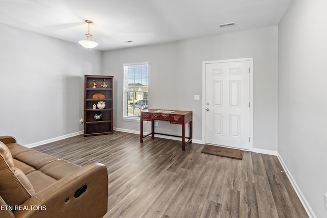 sitting room featuring hardwood / wood-style floors