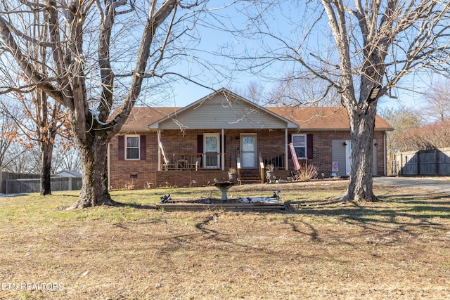 ranch-style home featuring a front yard and a porch