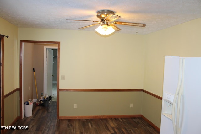 unfurnished room featuring a textured ceiling, ceiling fan, and dark hardwood / wood-style flooring