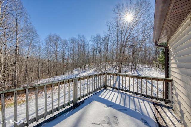 view of snow covered deck