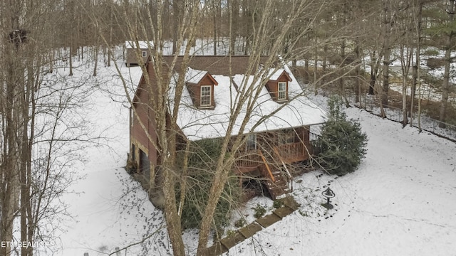 view of snow covered property