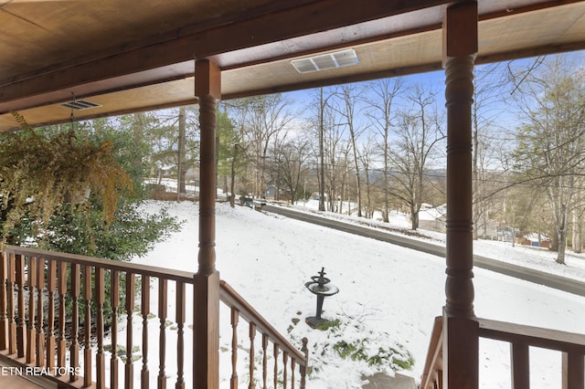 view of yard covered in snow