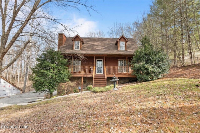 view of front of home with a chimney