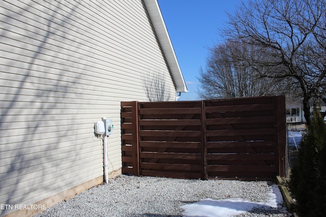 view of snow covered gate