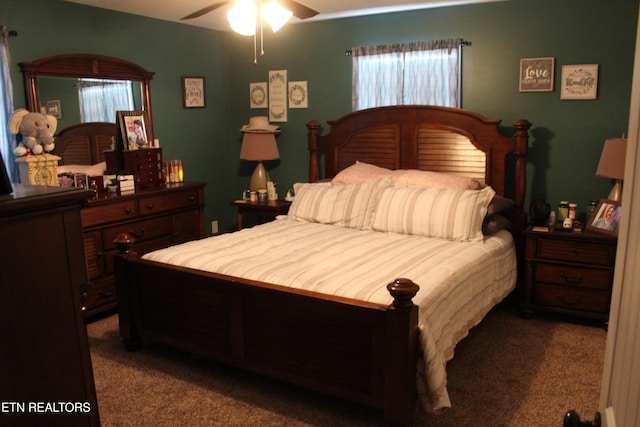 carpeted bedroom with ceiling fan