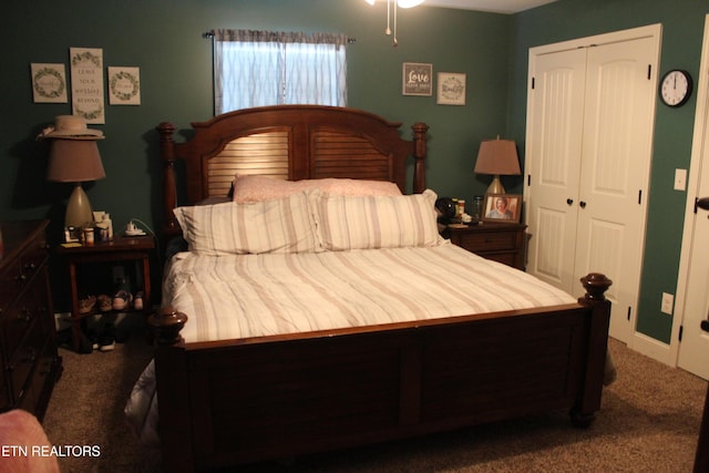 bedroom with a closet and carpet flooring