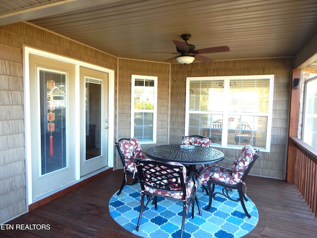 exterior space featuring ceiling fan