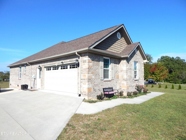 view of property exterior featuring a garage and a lawn