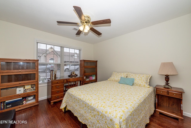 bedroom featuring ceiling fan and dark hardwood / wood-style flooring