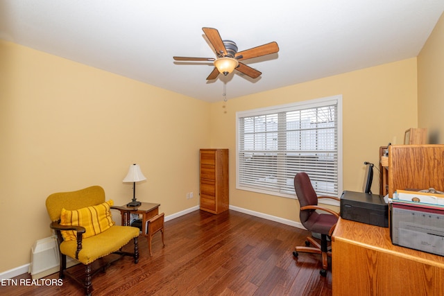 office space featuring ceiling fan and dark hardwood / wood-style floors