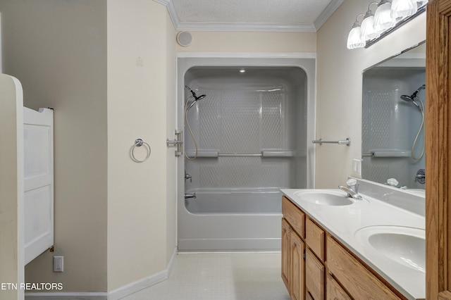 bathroom with a textured ceiling, ornamental molding, washtub / shower combination, and vanity