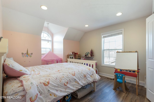 bedroom featuring lofted ceiling and dark hardwood / wood-style floors