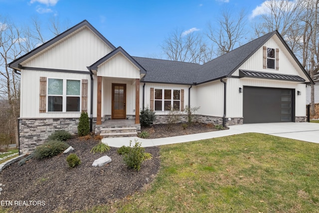 modern farmhouse with a front lawn and a garage