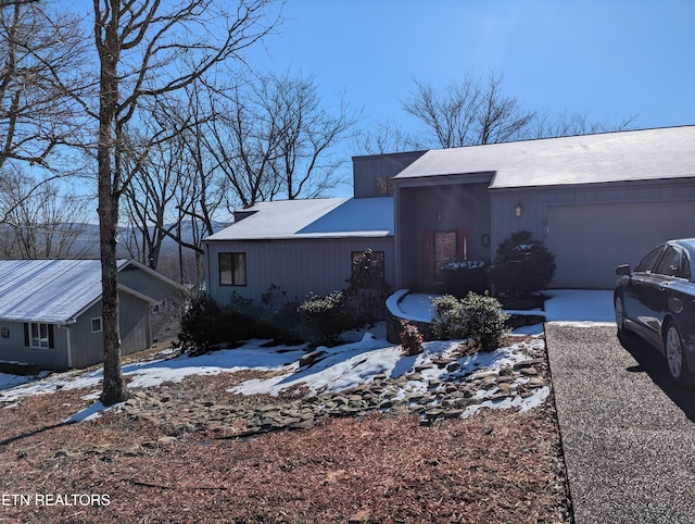 view of front of home featuring a garage