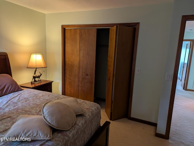 124 Sugarbush Cir, Crossville, TN 38558 - bedroom with light colored carpet, baseboards, and a closet