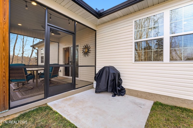 view of patio / terrace featuring ceiling fan