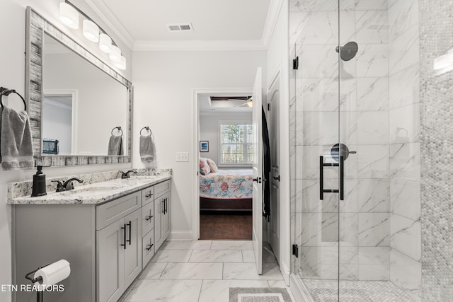 bathroom with crown molding, vanity, and walk in shower