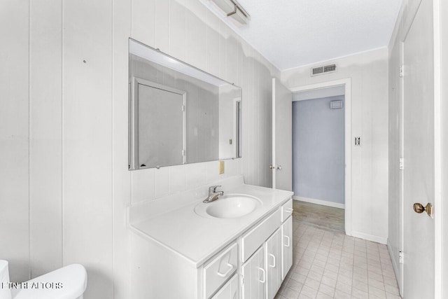 8305 Sharp Rd, Powell, TN 37849 - bathroom featuring toilet, baseboards, and vanity