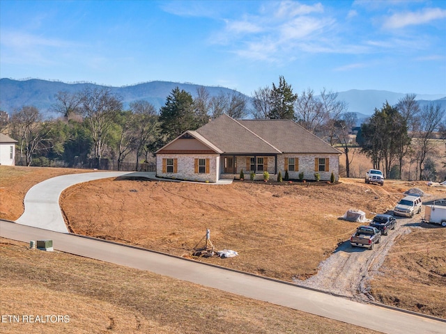 single story home with a mountain view