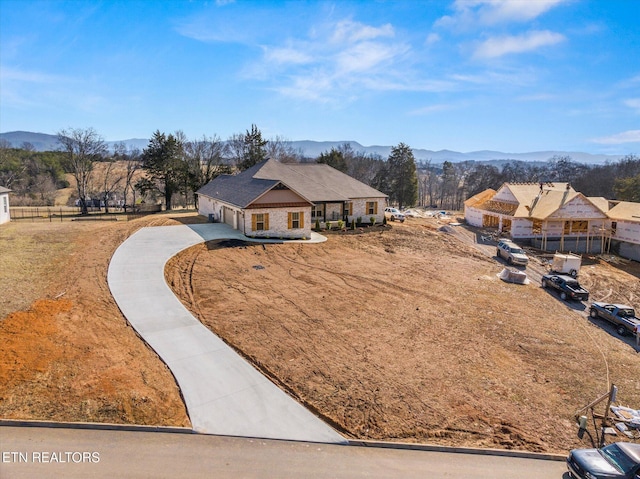 view of front of house with a mountain view