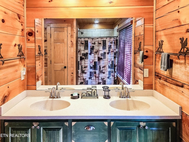 bathroom with wooden ceiling, wooden walls, and vanity