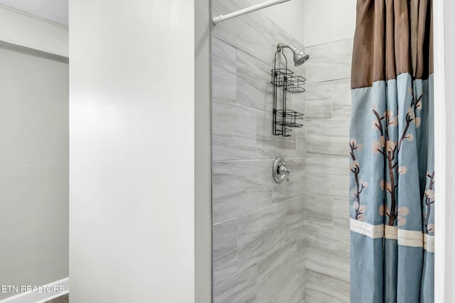 bathroom with curtained shower