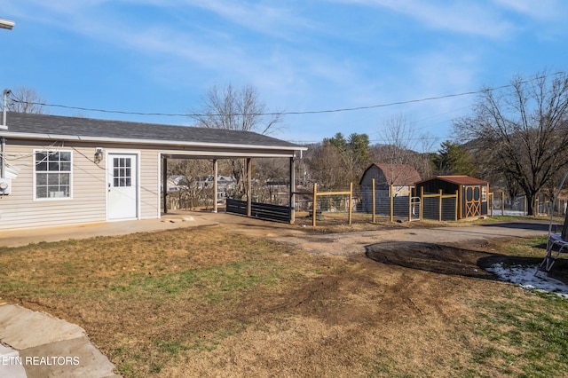 view of outdoor structure with a yard