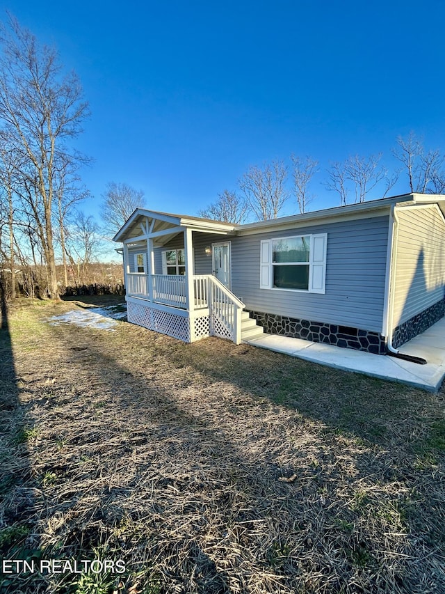 view of front facade featuring covered porch