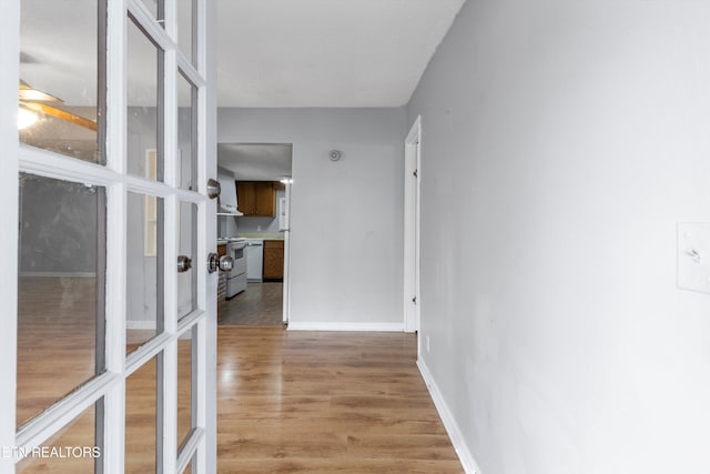 hallway featuring light hardwood / wood-style floors