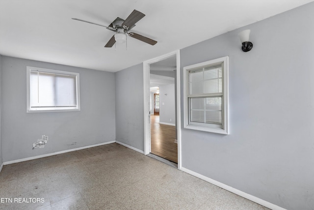 empty room featuring ceiling fan