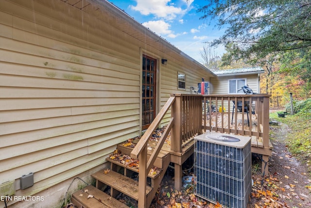 wooden deck featuring central AC