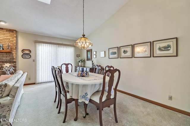 carpeted dining room with lofted ceiling and a notable chandelier