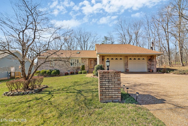 view of front of property featuring a front yard, driveway, roof with shingles, an attached garage, and brick siding