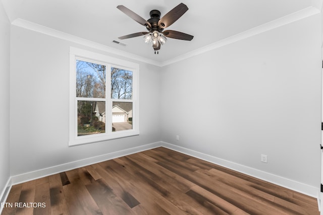 spare room featuring ceiling fan, ornamental molding, and hardwood / wood-style flooring