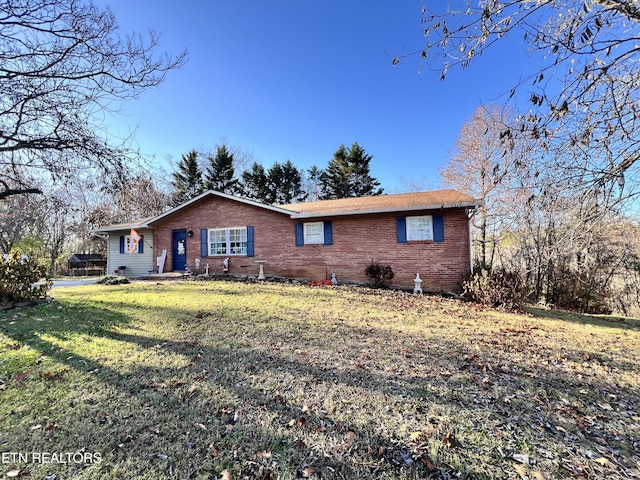 view of front of property with a front lawn