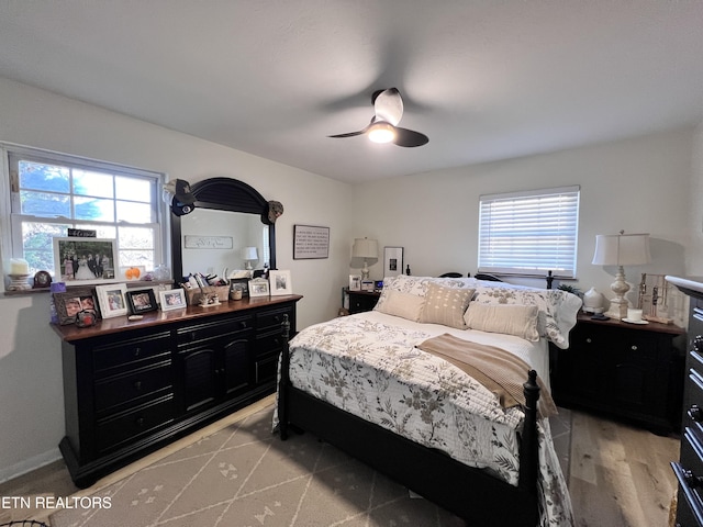 bedroom featuring ceiling fan and light wood-type flooring