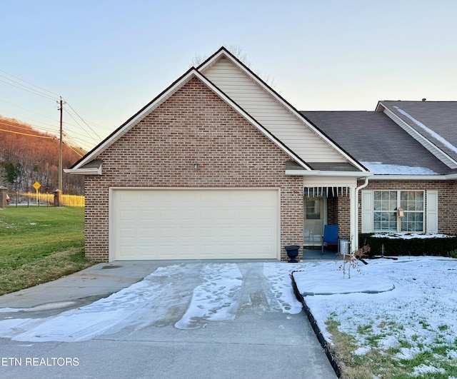 view of front of home with a garage