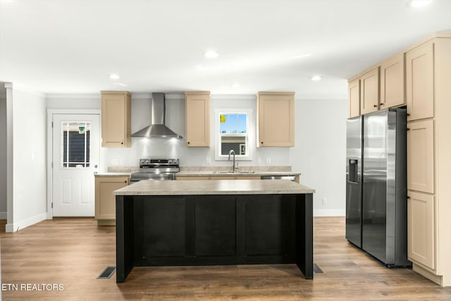 169 Dode St, Sweetwater, TN 37874 - kitchen with appliances with stainless steel finishes, wall chimney exhaust hood, a sink, a kitchen island, and baseboards